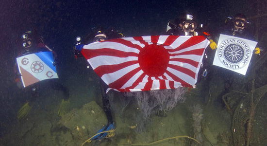 ‘Flying’ the Japanese Navy Ensign on HIJMS Haguro during one of our return visits, 2010. Photo Paul McMurrick