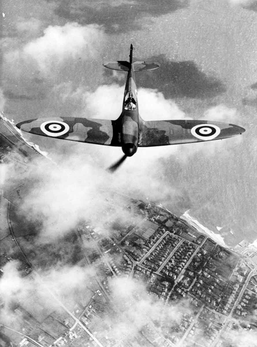 Spitfire F Mk.1 in flight viewed from slightly above.