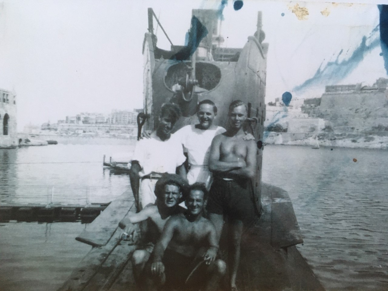 Colin Clements has sent a new group photo, of five men on Triumph's casing in Malta, some time around the middle of 1941.