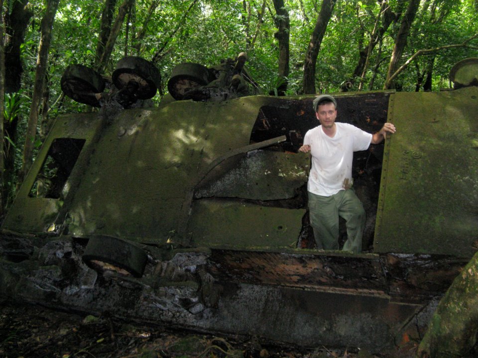 Grandpa's tank. The hole I am standing in was caused by a Japanese IED built from a Japanese aircraft bomb. Likely something in the 200-500lbs range. They buried them in the ground, with the nose pointed up. Inside this tank was the crew, surrounded by ammunition, and aviation fuel. Four of the five men in the tank crew were killed, along with a Marine Captain on the tank acting as a guide. I am only here today because a guy named George Lopes took my grandfather's place that day. His position was direct where I am standing in this photo.