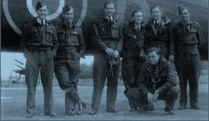 The Phillips Crew poses casually with a newly-delivered Halifax LQ-B (HR871) which would become “their” kite for many of their ops before losing her over Sweden. Left to right: Flight Sergeant John Alwyn “Pee Wee” Phillips, DFM, DFC, RAFVR, Pilot; Sergeant Wilfred H. “Joe” King, RCAF, Mid-Upper Gunner; Sergeant Vernon A. Knight, RAFVR, Bomb Aimer; Sergeant R.A. “Ron” Andrews, RAFVR, Wireless Operator; Sergeant Herbert C. McLean, RCAF, Flight Engineer; Sergeant Lloyd D. Kohnke, RCAF, Rear Gunner; and (squatting) Flight Sergeant Graham William Mainprize, RCAF, Navigator. Photo via John Alwyn Phillips, DFM, DFC