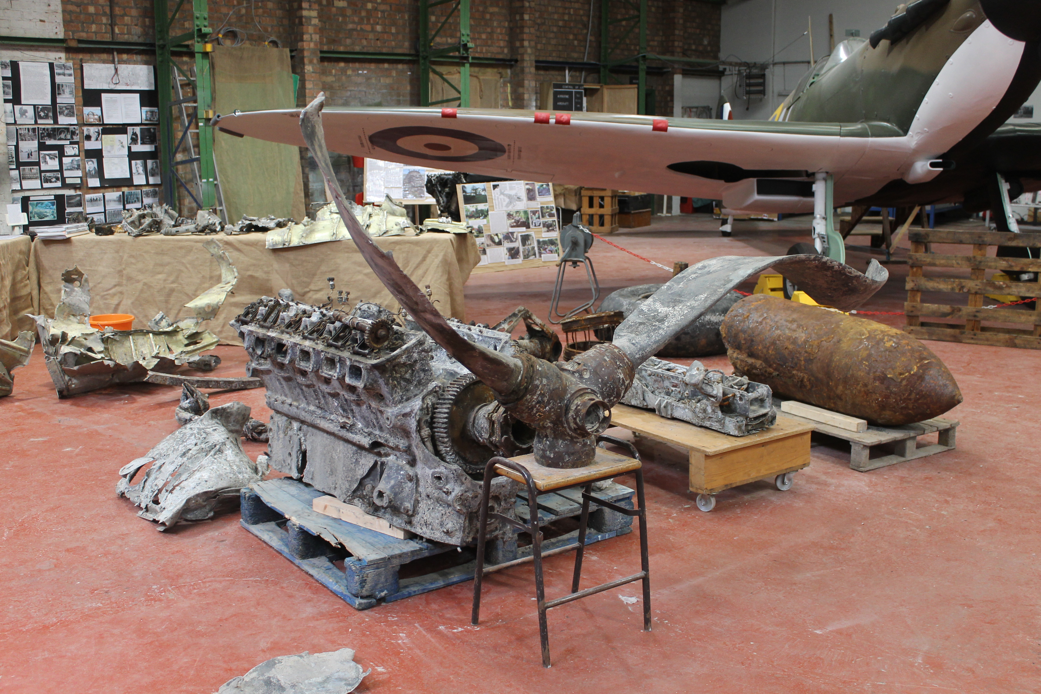 Items from the Ju 88 on temporary display at Hangar 42, Blackpool, awaiting custom made stands