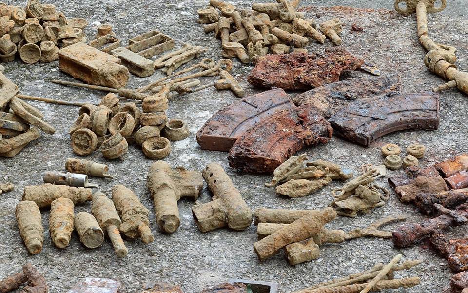 An assortment of ammo, clips and Bren magazines found in a dig