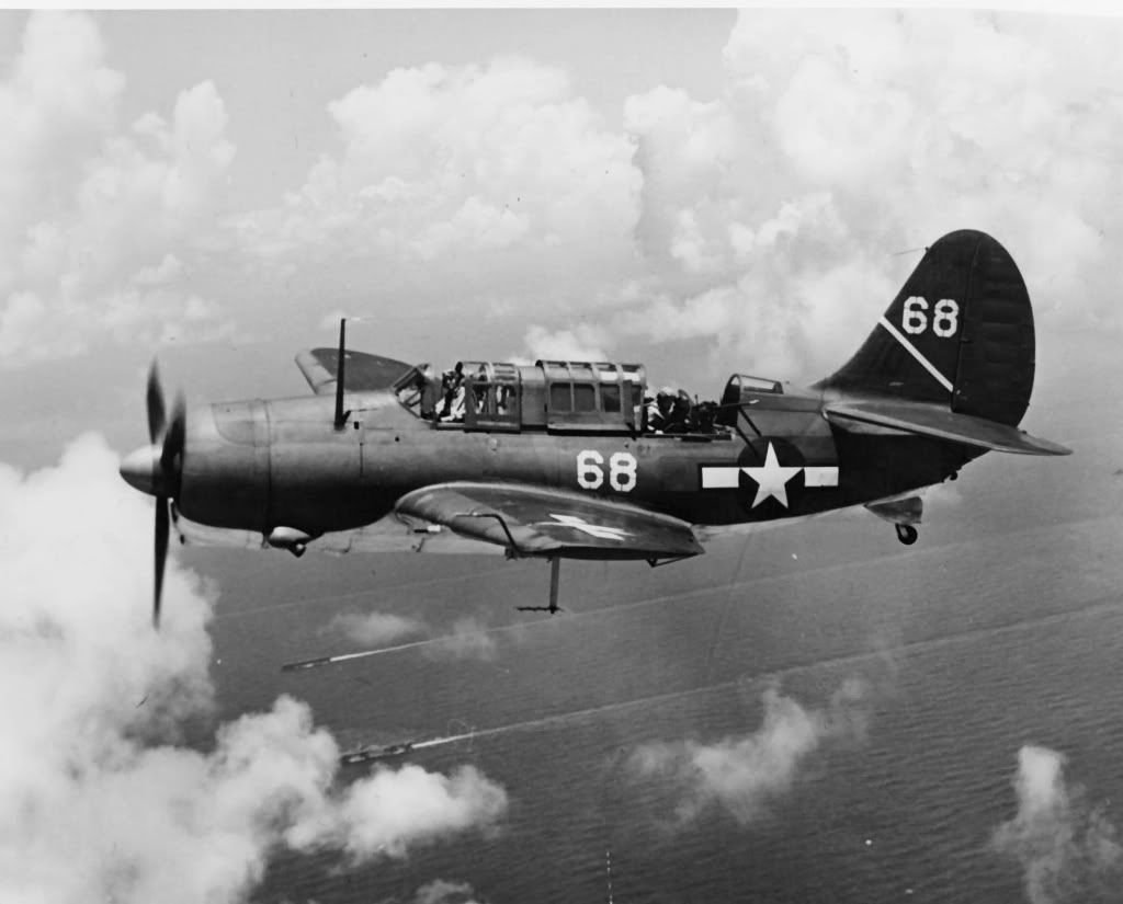 SB2C-1CofBombingSquadronOneVB-1picturedovershipsofTaskForce58enroutetoPaganstrike