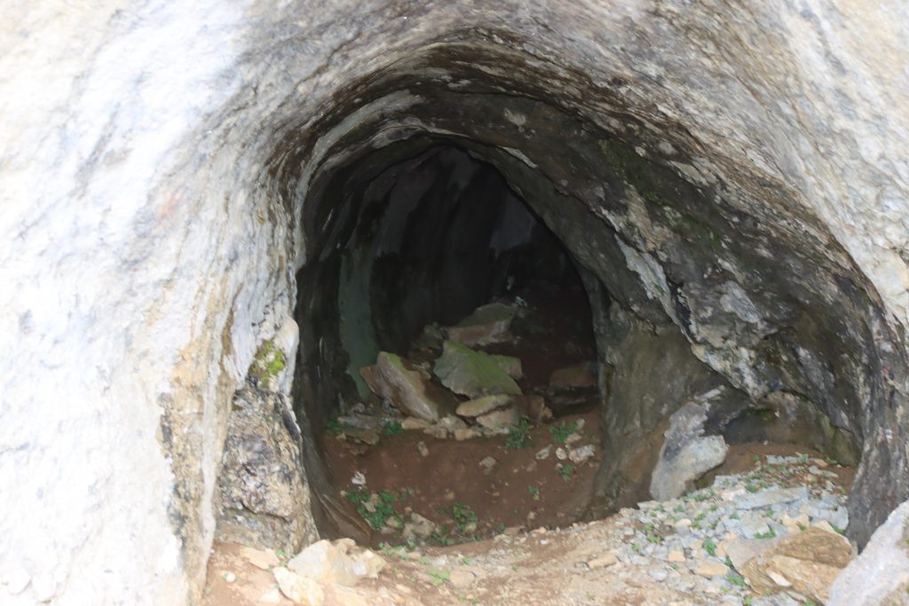 A cave used as an ammunition cache. Nothing remains inside today.