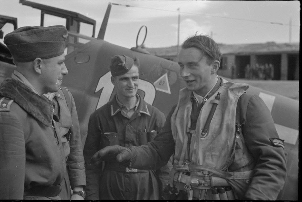 Rudolf Moycis (left) talks with colleagues at Maleme airfield in late 1943 ECPAD photo source Moycis identification: Jochen Prien